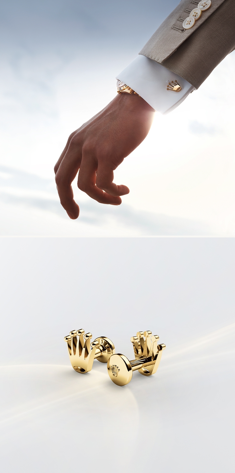 Crown cufflinks worn on wrist