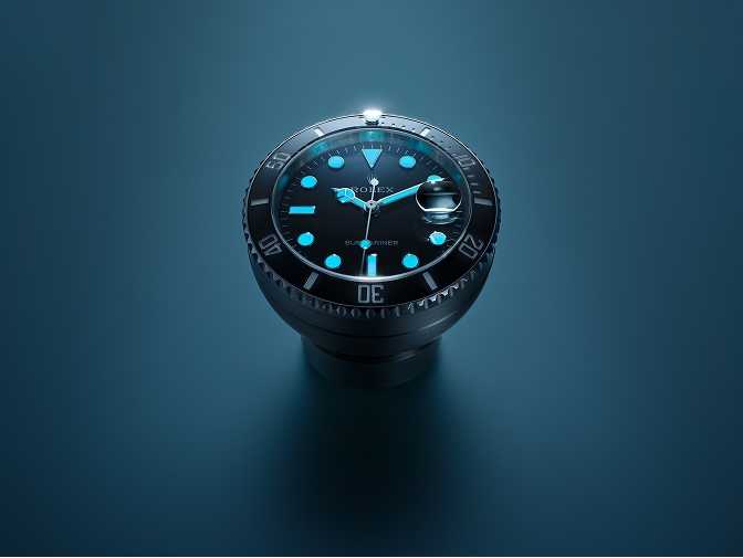 Rolex calendar clock glowing Chromalight display